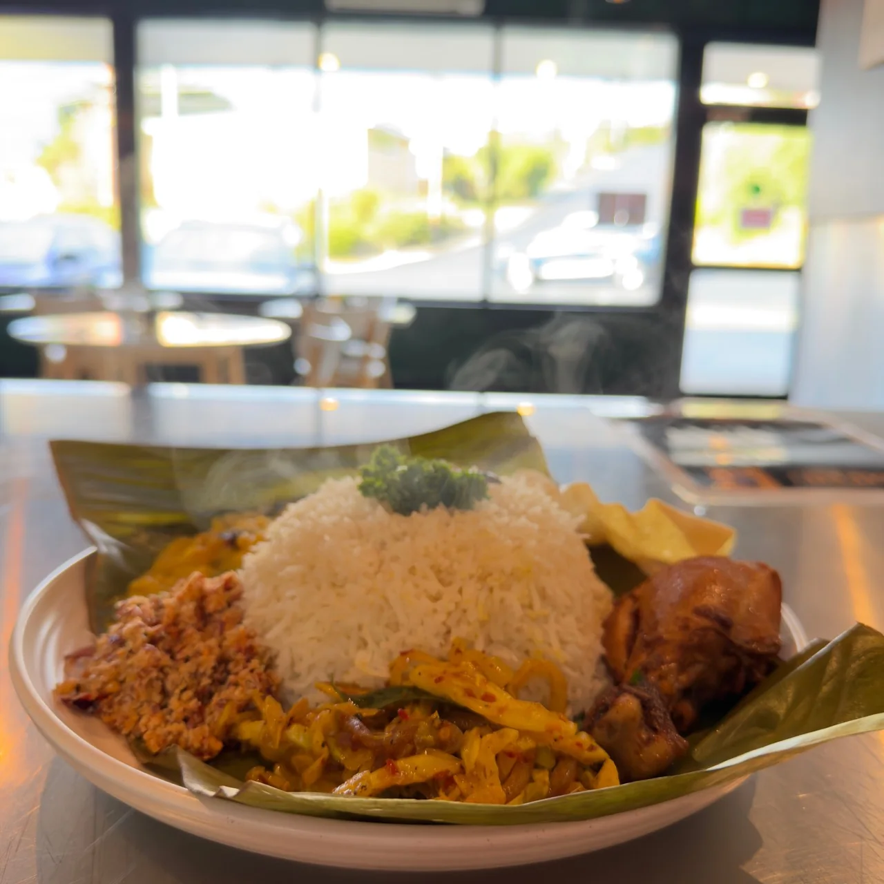 Rice and curry served in the 52 South dining room in Rosetta